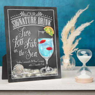 Schild für Signature Drink: Zwei Fische weniger im Fotoplatte