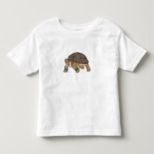 Schildkröte als Runner mit Handtuch Kleinkind T-shirt