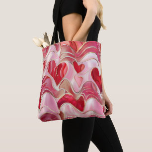 SCHIRME VON WIRBLEN VALENTINHERZEN IN PINK UND GOL TASCHE