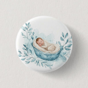 Schlafendes Baby in blauer Wiege Button