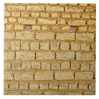 Schlammige Backsteinmauer Fliese
