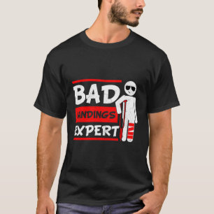 Schlechte Landungen Experte gebrochene Knochen-Fuß T-Shirt
