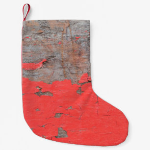 Schließen Sie alte und schälende lackierte Holzpla Kleiner Weihnachtsstrumpf