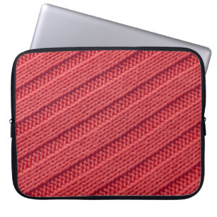 Schließen Sie Stripy Häkelstruktur Textur. Laptopschutzhülle