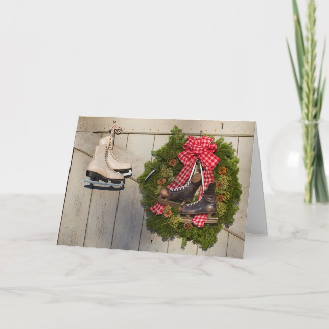 Schlittschuhe mit Weihnachtskranz Feiertagskarte (Vorderseite)