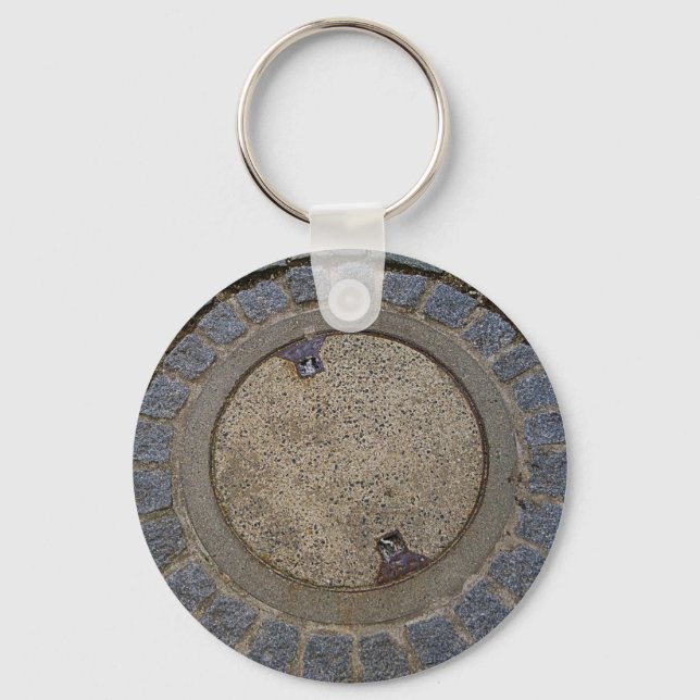 Schlüsselanhänger mit Manhole-Abdeckung und Kopfst (Vorderseite)