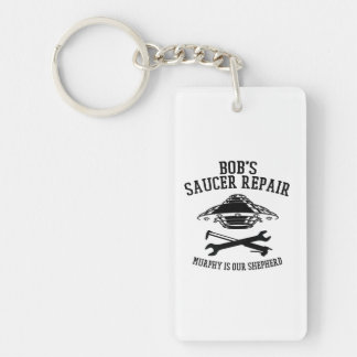 Schlüsselanhänger mit Saucer-Repair-Logo des schwa