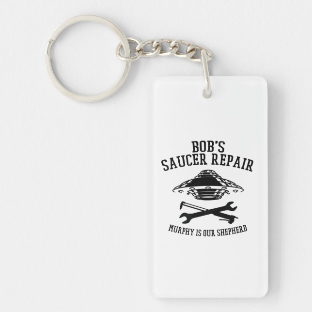 Schlüsselanhänger mit Saucer-Repair-Logo des schwa (Vorderseite)