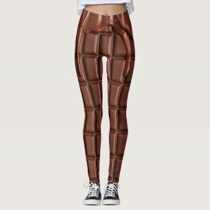 Schmelzschokolade, die über einen Schokoladenbloc Leggings