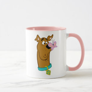 Schmetterling auf Scooby-Doos Nase Tasse
