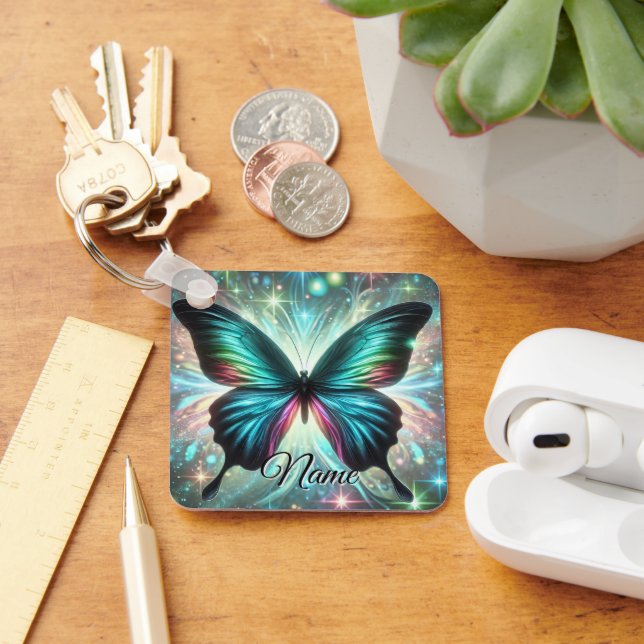 Schmetterling mit galaktischem Glühen und glühende Schlüsselanhänger (Schreibtisch)