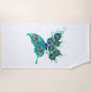 Schmetterling mit grünen Pfauenfedern Strandtuch
