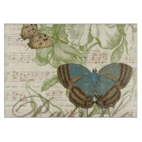 Schmetterlinge auf Notenpapier mit Blumendesign