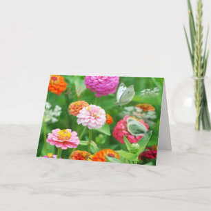 Schmetterlinge in einer Zinnien-Garten-Grußkarte Karte