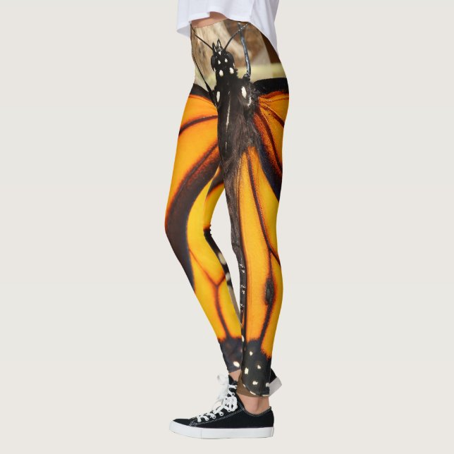 Schmetterlingsfliege-Leggings - Schlagen Sie sich  Leggings (Links)