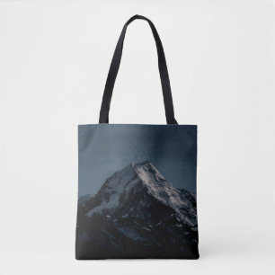 SCHNEE GEDECKTER BERG WÄHREND DER NACHTZEIT TASCHE