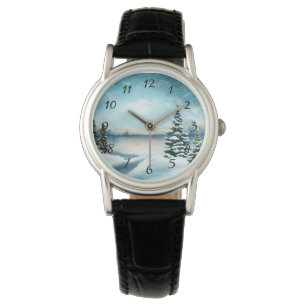 Schneebedeckte Kiefern in der Nähe eines Sees Armbanduhr