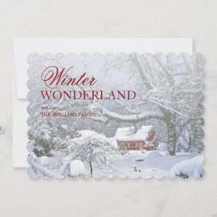 Schneedeckelandschaft und rote Scheune im Abstand