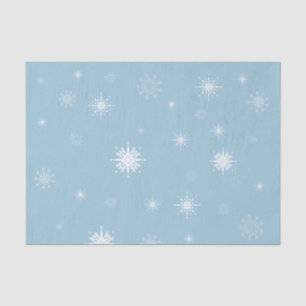 Schneeflocken auf blauem Seidenpapier