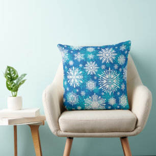 Schneeflocken auf blauem Wurfkissen Kissen