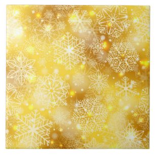 Schneeflocken auf goldenen Flächen Fliese