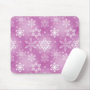 Schneeflocken auf rosa mousepad