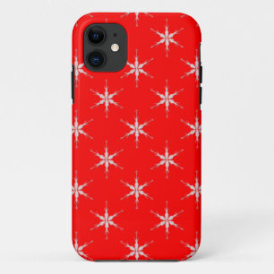 Schneeflocken aus Glas im roten Hintergrund iPhone 11 Hülle