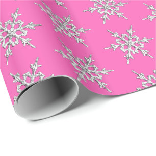 Schneeflocken, Silberkristalle auf Fuchsienrosa Geschenkpapier
