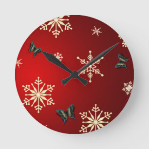 Schneeflocken und Schmetterlinge Runde Wanduhr
