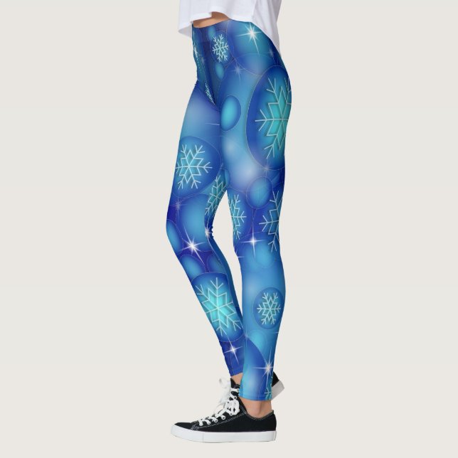 Schneeflocken und Sterne auf Winter Blue Leggings (Links)