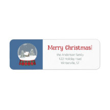 Schneekugel mit kleinem Haus -