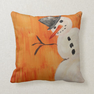 Schneemann auf Orange Kissen