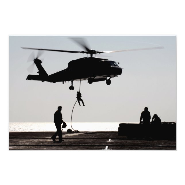 Schnelles Seil des Personals aus einem SH-60F Fotodruck (Vorne)