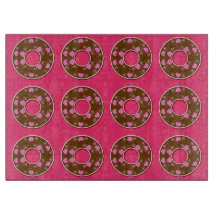 Schokolade Donuts auf heißen rosa Schnittpappe