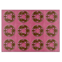 Schokoladendonuts Donuts Donuts auf rosa Schneideb