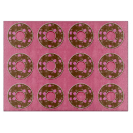 Schokoladendonuts Donuts Donuts auf rosa Schneideb Schneidebrett