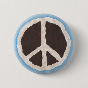 Schokoladenfriedenszeichentorte mit Peitschecreme, Button