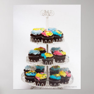 Schokoladenkleine kuchen auf einem Kuchenstand Poster