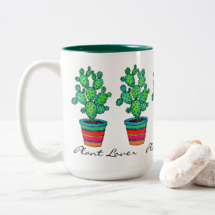 Schöne Aquarellkaktus in schöner Quelle Zweifarbige Tasse