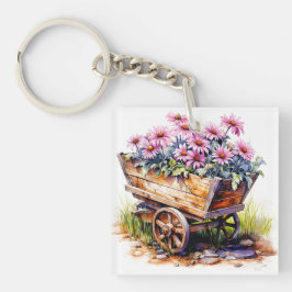 Schöne Aster-Blume in einem Radfass Schlüsselanhänger