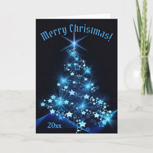 Schöne blaue leuchtende Sterne am Weihnachtsbaum Karte