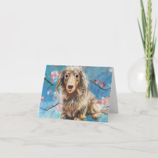 Schöne Dackel mit langer Haare in Kirschblüten Karte