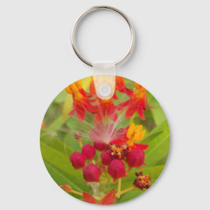 Schöne, farbenfrohe Blüte mit Milkweed Art Printin Schlüsselanhänger