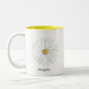 Schöne Gänseblümchen-Blume auf Weiß Zweifarbige Tasse