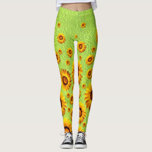 Schöne gelbe Blumen auf abstraktem Grün Leggings