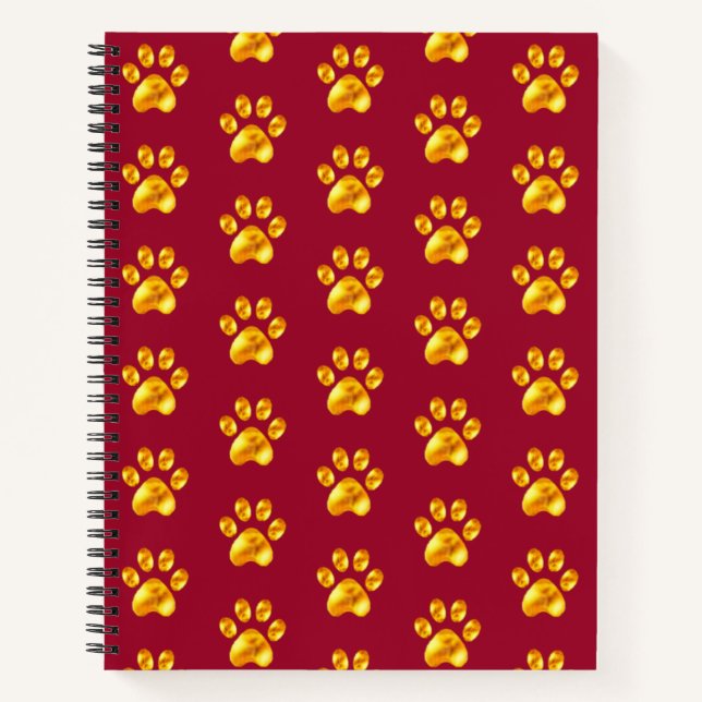 Schöne goldene Paws auf dem Maroon Notizbuch (Vorderseite)