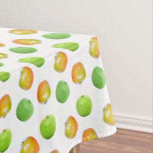 Schöne grüne Äpfel auf weißer Tischdecke