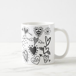 Schöne Herzen in schwarzer Tasse
