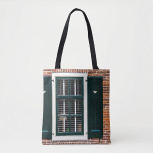 Schöne holländische traditionelle Häuser. Ziegelma Tasche