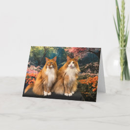 Schöne Katzen im farbenfrohen Frühlingsgarten Karte